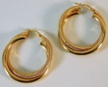 A pair of 9ct gold earrings 4g