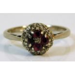 An 18ct gold diamond & ruby ring size P/Q 3.9g