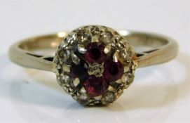 An 18ct gold diamond & ruby ring size P/Q 3.9g
