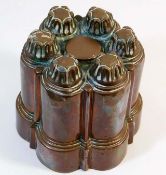 An antique copper jelly mould