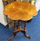 An early/mid 19thC. walnut table with decorative i