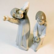 A pair of Lladro porcelain bedtime children figure