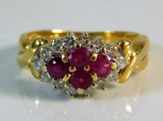 An 18ct gold diamond & ruby ring 3.3g size H/I