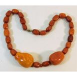 A Victorian butterscotch amber necklace 79g