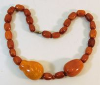 A Victorian butterscotch amber necklace 79g