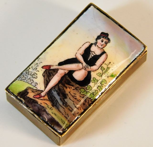 An antique brass enamelled vesta box with strike