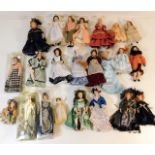 A quantity of miniature dolls house clothed figure