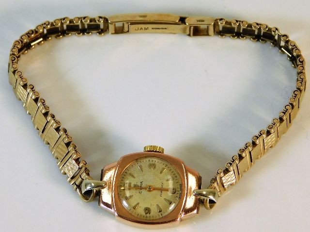 A 9ct gold case & strap ladies watch by Cyma 16.5g