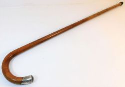 A gents silver tipped malacca walking cane 36.25in