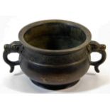 A Chinese bronze two handled censer bowl with chas