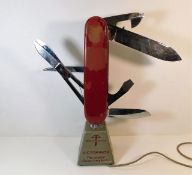 A Victorinox Swiss Army Knife shop display, in wor