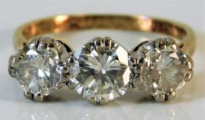 An 18ct gold trilogy ring set with approx. 1.8ct d