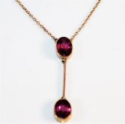 An Edwardian 15in yellow metal necklace set with garnet 2.2g