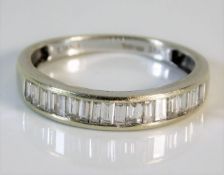 A boxed 18ct white gold half eternity Iliana ring of approx. 1ct size R/S 3.2g