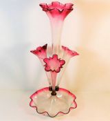 A Victorian glass epergne tipped with cranberry 19