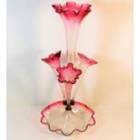 A Victorian glass epergne tipped with cranberry 19