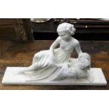 An antique French plaster figure marked Depose No.