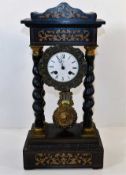 An inlaid French portico clock with twist pillars,