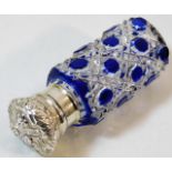 A 19thC. cut glass silver topped scent bottle with