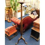 A Victorian oak torchere 57.75in tall