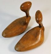 A pair of antique wooden shoe lasts