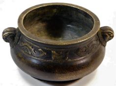 A Chinese bronze two handled censer bowl with chas