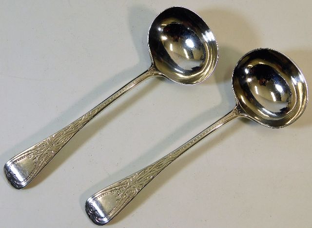 A pair of 1882 silver ladles by Hollandson & Slate