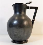 A Christopher Dresser style pewter hot water jug w