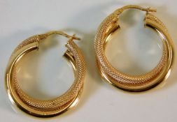 A pair of 9ct gold hoop earrings 3.1g