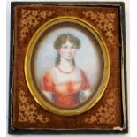 A 19thC. miniature watercolour of young woman on i