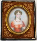 A 19thC. miniature watercolour of young woman on i