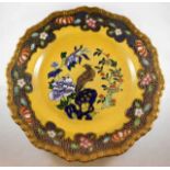 A c.1910 Mason's gilded plate with bird decor 10.5