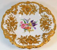 A Meissen porcelain plate with gilded relief decor