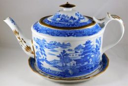 A Miles Mason blue & white gilded teapot with stan