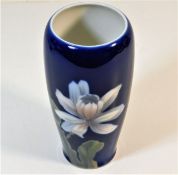 A porcelain Royal Copenhagen vase with floral deco