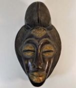 An African Punu-Lumbo style mask 15in tall