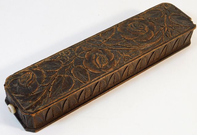 An 18thC. carved pencil case, formerly the propert