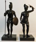A pair of spelter figures featuring gladiators, on