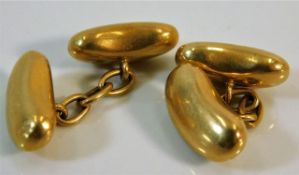 A pair of 18ct gold kidney shaped cuff links 4.9g