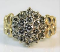 An 18ct gold diamond cluster ring of approx. 1.25c