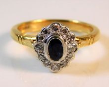 An 18ct diamond & sapphire ring set with approx. 0