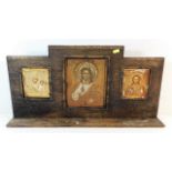 An oak mounted icon triptych 26in wide x 13in high