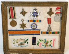 A framed medal & badge display including a Special