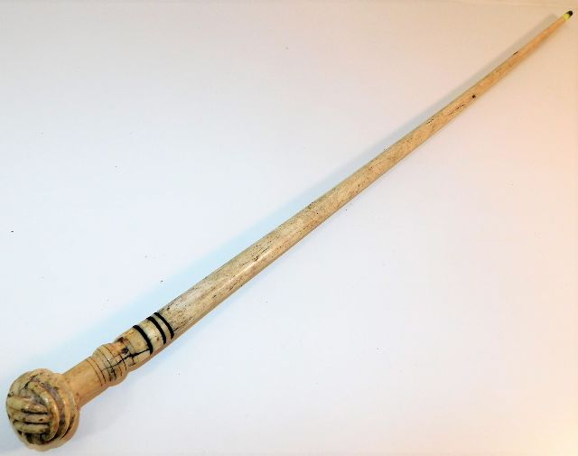 A 19thC. polished narwhal tusk walking cane with c