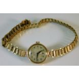 A ladies 9ct gold Buren Grand Prix watch