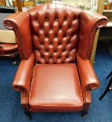 A Thomas Lloyd leather wingback Chesterfield armch