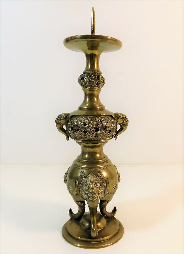 A Meiji period brass Japanese pricket altar stick