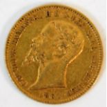 A Victor Emmanuel II gold 20 Lire coin 6.4g