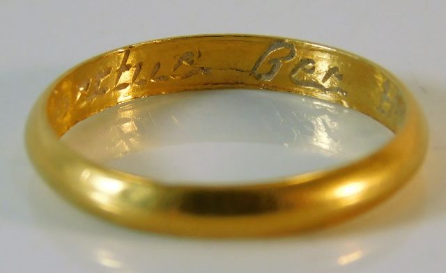 A c.1720 yellow metal posy ring with inscription "