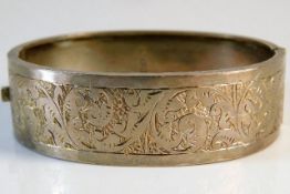 A Victorian chased silver bangle possibly by Horac